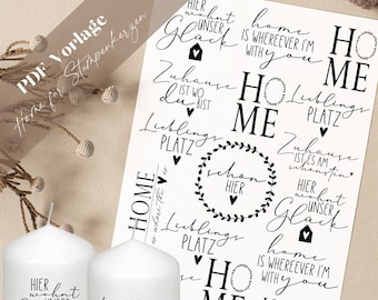 Op de afbeelding: Een vel met zwart-witte, printbare stickers met verschillende huis-thema zinnen en ontwerpen. De zinnen omvatten "Thuis is waar het hart is", "Thuis is waar ik ook ben met jou", "Hier woont ons geluk" en "Favoriete plek".