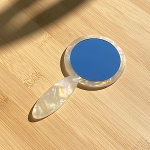 Eco-Friendly Handheld Mirror: Bioplastic Travel Makeup Touchup