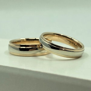 Handcrafted two tone bicolor 14K yellow and white gold wedding band rings set