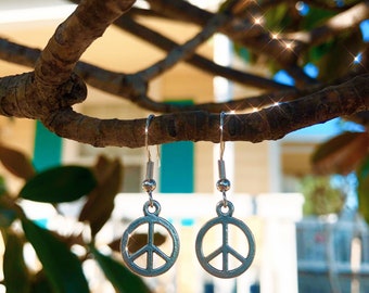 Peace sign dangle earrings