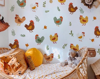 May include: A child's bedroom with a rattan bed and chicken-themed wall decals. The decals feature colorful cartoon chickens, green leaves, and orange flower accents. The bedding includes a yellow pillow and a patterned comforter.