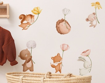 May include: A set of watercolour animal wall decals featuring a squirrel, hedgehog, bear, fox, bunny, and a bear holding flowers. The decals are perfect for a nursery or child's room.