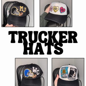 May include: Four black trucker hats with different colorful patches. The patches include a football helmet with the letters "MJ", two candy hearts with the text "Back Off" and "Drop Dead", a football helmet with the letters "WC", and a sun and moon with the text "The Sun" and "The Moon".