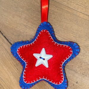 Blue and red Felt star ornament white button star center