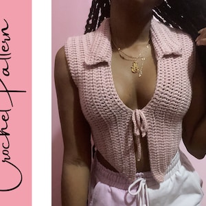 May include: A light pink crochet top with a collared neckline and tie closure. The sleeveless top is handmade with a textured stitch. The words "Crochet Pattern" are written in a cursive font on a pink background.