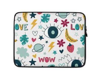 May include: A white laptop sleeve with a colorful pattern of stars, hearts, lightning bolts, bananas, eyes, flowers, planets, and the words "LOVE", "WOW", and "LOVE".
