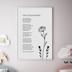 May include: A black and white printable wall art print with a poem titled "Two Little Shadows" about a young mother and her two children. The poem is accompanied by a simple line drawing of two flowers.
