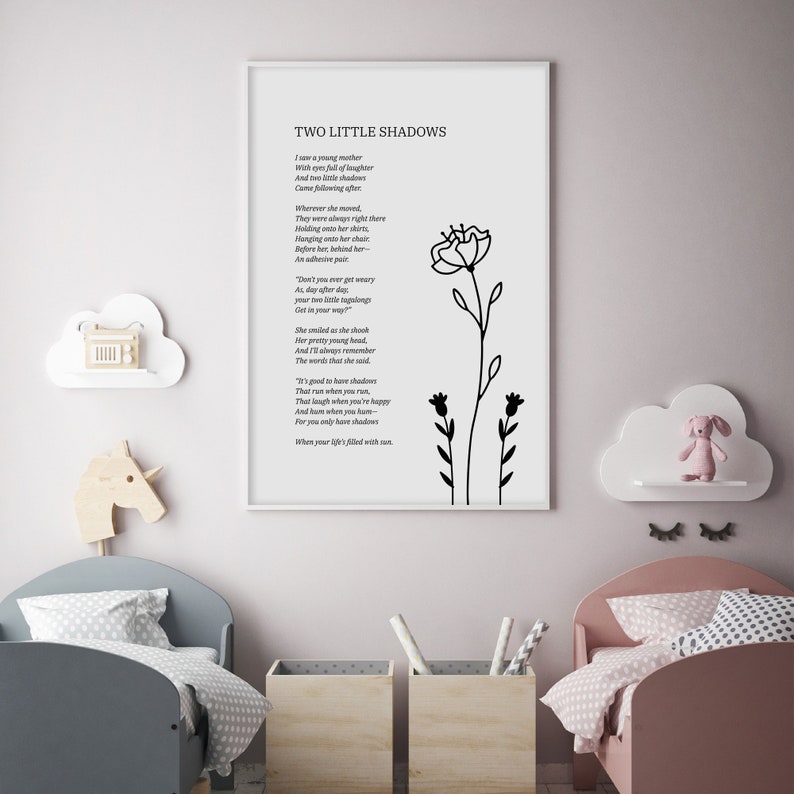 May include: A black and white printable wall art print with a poem titled "Two Little Shadows" about a young mother and her two children. The poem is accompanied by a simple line drawing of two flowers.
