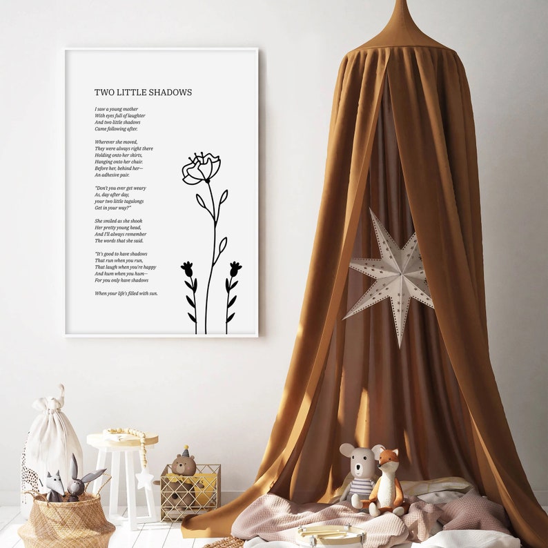May include: A black and white printable art print with a poem titled "Two Little Shadows". The poem is about a young mother and her two shadows. The print features a simple floral design.