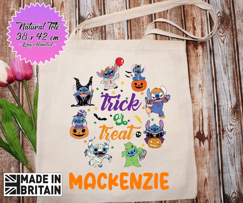 May include: A natural tote bag with long handles, measuring 38 x 42 cm. The bag features a colorful design with multiple cartoon Stitch characters from the Disney movie Lilo & Stitch. The characters are dressed in Halloween costumes and the text "trick or treat" is written in a whimsical font. The bag is personalized with the name "MACKENZIE".