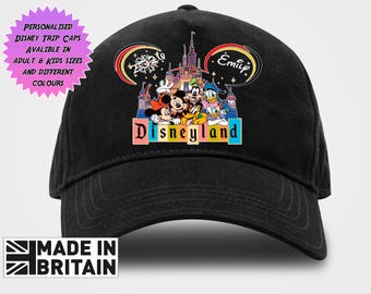 May include: A black baseball cap featuring a colorful graphic of Mickey Mouse, Minnie Mouse, Donald Duck, Daisy Duck, Goofy, and Pluto in front of a castle. The text "Disneyland" is printed below the characters, with "2024" and "Emily" in ears.