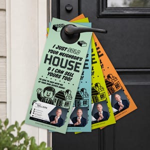 May include: A set of four colorful real estate door hangers in light green, blue, yellow, and orange. Each hanger features a cartoon figure, a house graphic, and the text I JUST SOLD YOUR NEIGHBOR'S HOUSE & I CAN SELL YOURS TOO! with contact info.