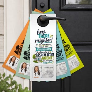 May include: A set of colorful door hangers in orange, light green, teal, and yellow, each featuring a photo of a real estate agent, a house illustration, and the text: Hey there neighbor! If you didn't know, I'm not just your neighbor, I'm also a real estate agent! Proud to live here. Happy to help!