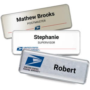 May include: Three rectangular name badges with rounded corners. The top badge is silver with black text reading Mathew Brooks and POSTMASTER. The middle badge is white with black text reading Stephanie and SUPERVISOR. The bottom badge is silver with black text reading Robert. All badges feature the United States Postal Service logo.