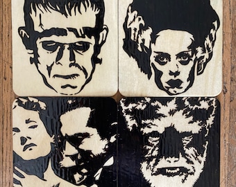 May include: Set of four square coasters featuring black and white illustrations of classic horror movie monsters. The coasters feature Frankenstein's monster, the Bride of Frankenstein, the Creature from the Black Lagoon, and the Wolfman.