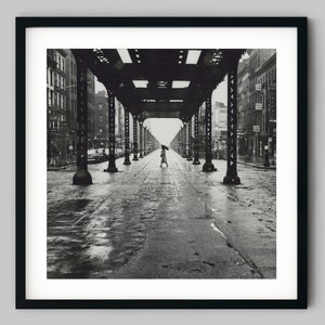 Woman with an rain umbrella walks across a New York City Street Black and White Photography fine art print - Wall Decor