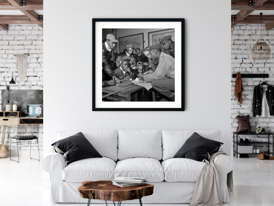 Tuskegee airmen pilots plan an air raid for the American ...