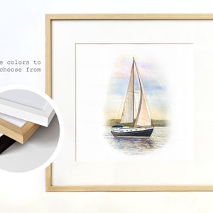 May include: A watercolor painting of a sailboat on the water. The sailboat has white sails and a blue hull. The water is a light blue color and there are clouds in the sky. The painting is framed in a light wood frame.