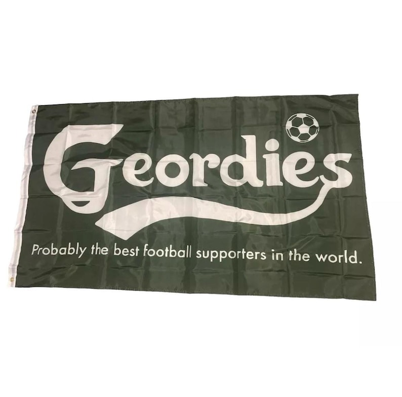 May include: A green flag with white text that reads "Georddies" and a white football. The text is in a curved font and the flag says "Probably the best football supporters in the world."