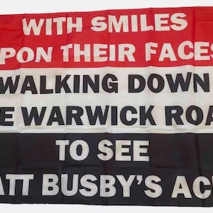 May include: A red, white, and black flag with the text "WITH SMILES UPON THEIR FACES WALKING DOWN THE WARWICK ROAD TO SEE MATT BUSBY'S ACES".