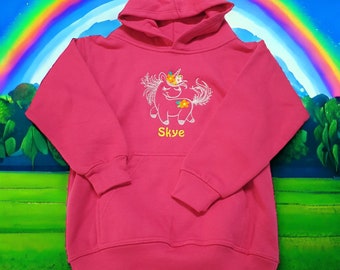 May include: Pink hooded sweatshirt with a white embroidered unicorn with flowers and the name "Skye" on the front.