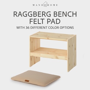 May include: A light-colored wooden bench with two shelves and a beige felt pad. The text "RAGGBERG BENCH FELT PAD" is displayed above the bench, with the text "WITH 36 DIFFERENT COLOR OPTIONS" below it. The bench is made of light-colored wood.