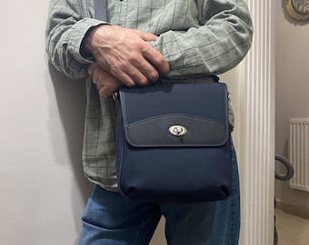 Luxury Canvas Crossbody Bag: Leather Accents, Twist-Lock Closure
