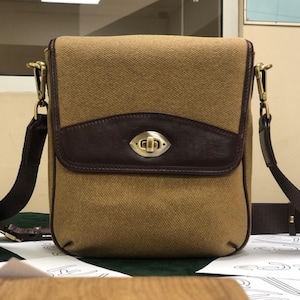 EDINDE Sac à bandoulière de luxe en toile et cuir - Élégant sac messager unisexe avec plusieurs poches, verrou à rotation