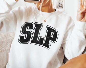 May include: White sweatshirt with a black vintage-style graphic that says "SLP".