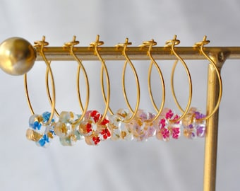 Small stainless steel flower hoop earrings with real little flowers