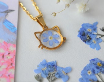Cat head pendant and real pressed forget-me-not