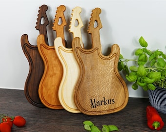 Personalized wooden board as a gift for a child&#39;s birthday in a unique guitar design