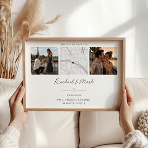 May include: A framed rectangular print titled THE DAY WE SAID YES featuring two photographs of a couple, a central map with a red heart, the names Rachael & Mark, a ring icon, the word ENGAGED, Paris, France, 15.06.2026, and coordinates 48.8566 N, 2.3522 E.