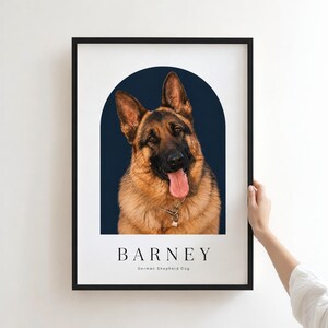 May include: A framed portrait print featuring a German Shepherd dog with a black and tan coat, tongue out, set against a dark blue arch background. The text BARNEY and German Shepherd Dog is printed in black below the dog portrait.