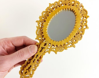 Vintage gesneden houten handspiegel uit het midden van de eeuw volkskunst ca jaren 60 - klein / mini
