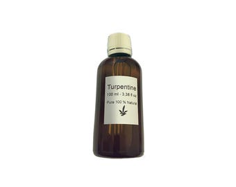 May include: A brown glass bottle with a white cap, labeled "Turpentine 100 ml - 3.38 fl oz Pure 100% Natural".