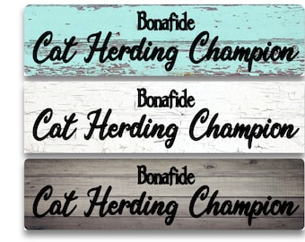 Cat Herding Champion Metal Sign – Rustic Wood or Rusty Background