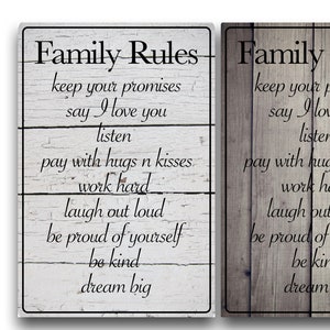 May include: Two white and gray wood signs with black text that reads "Family Rules" and lists rules for family members. The rules include "keep your promises", "say I love you", "listen", "pay with hugs n kisses", "work hard", "laugh out loud", "be proud of yourself", "be kind", and "dream big".