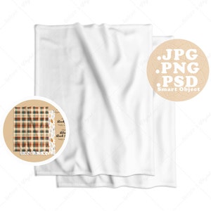 May include: A white kitchen towel mockup with a brown circle containing a plaid pattern and text. The circle also contains the text "JPG, PNG, PSD Smart Object".