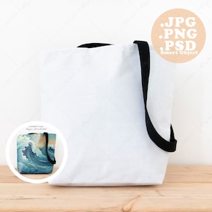 May include: A white tote bag with black handles. The bag has a square design with a colorful image of ocean waves. The image is in a circle with the text "example in use design not included".
