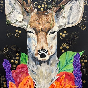 May include: A mixed media collage featuring a deer head with antlers adorned with green vines and white flowers. The deer is surrounded by colorful flowers and leaves on a black background with gold accents.