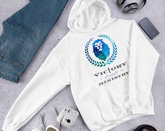 May include: White hooded sweatshirt with a blue and green watercolor lion logo and the text "Victory Street Ministry est. 2020".
