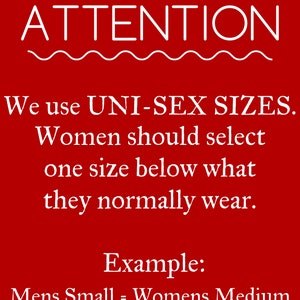 May include: Red background with white text that reads "ATTENTION" with a wavy line underneath. The text continues: "We use UNI-SEX SIZES. Women should select one size below what they normally wear. Example: Mens Small = Womens Medium."