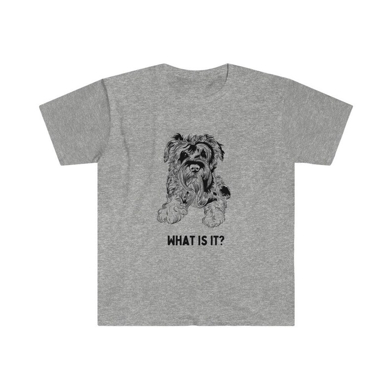 May include: A gray t-shirt with a black and white illustration of a Schnauzer dog. The text "WHAT IS IT?" is printed below the dog.