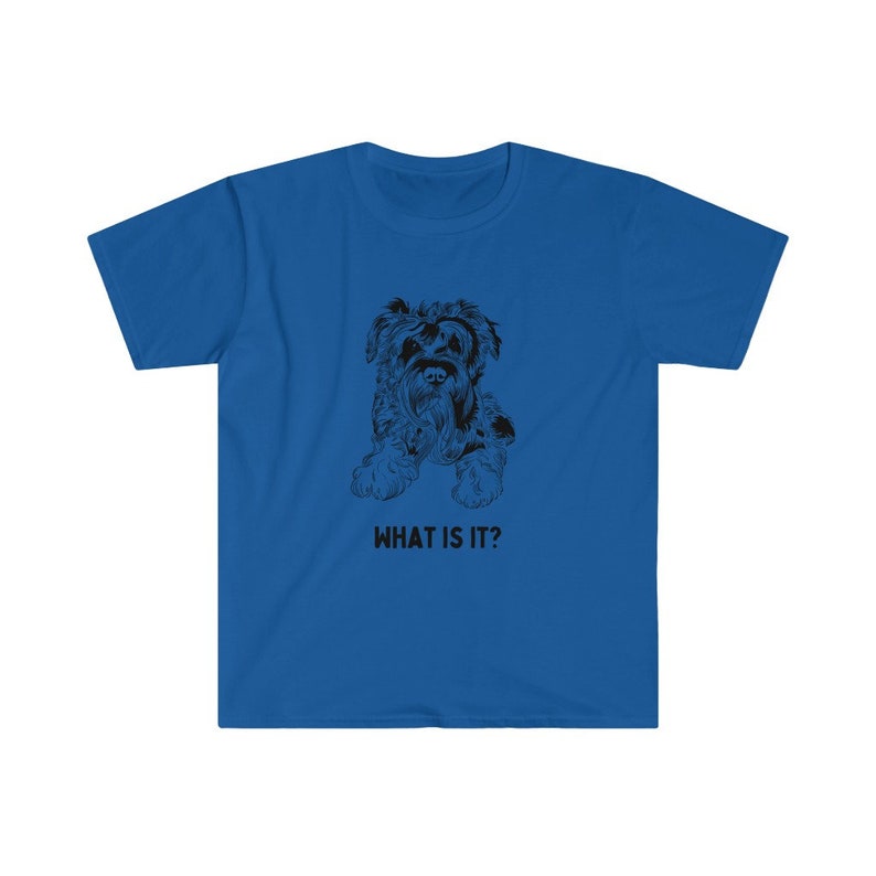 May include: A blue t-shirt with a black and white illustration of a dog and the text "WHAT IS IT?"