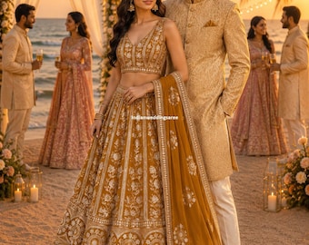 May include: A mustard yellow lehenga choli featuring intricate white floral embroidery and a matching dupatta. The ensemble includes a sleeveless V-neck blouse and a voluminous skirt with detailed circular patterns at the hem, worn with a sherwani.