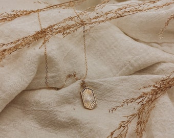 The sunburst medallion pendant necklace