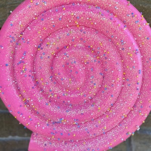 XXL lollipop bright pink with removable handle 19 inch diameter . 63 inches tall