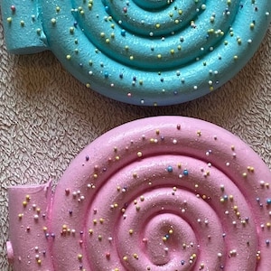Set of four pastel faux candyland lollipops 17 inch diameter 53 inches tall
