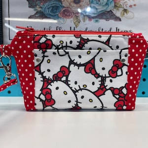 Monedero de muñeca gatito